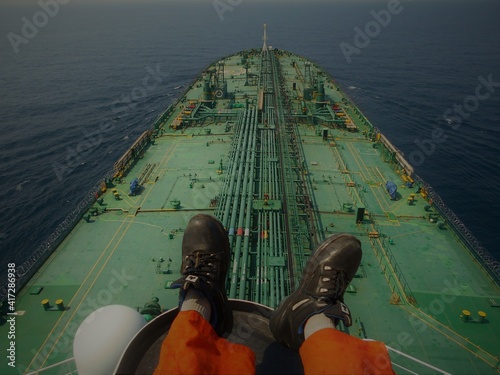  a merchant ship is underway at Sea, the picture is taken from the bridge wings