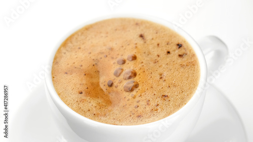 coffee in white cup on white background. perfect breakfast
