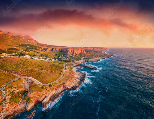 Aerial landscape photography. Picturesque sprimng sunset on Sicily, San Vito cape, Italy, Europe. Captivating evening seascape of Mediterranean sea. Beauty of nature concept background.