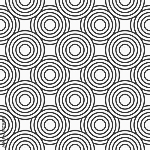 Abstract seamless pattern. Concentric circles. Intersecting repeating circles background. Overlaping circles. Stylish texture. Repeating geometric tiles. Flat design. Vector monochrome background.