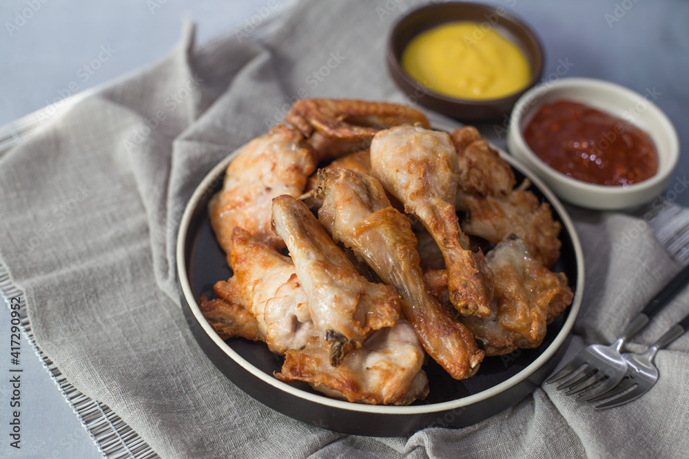 fresh crispy Korean fried chicken with two sources. fresh crispy Korean fried chicken with two sources.