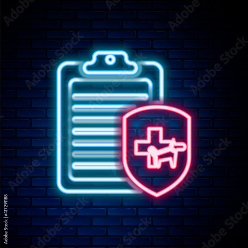 Glowing neon line Clipboard with medical clinical record pet icon isolated on brick wall background. Health insurance form. Medical check marks report. Colorful outline concept. Vector.