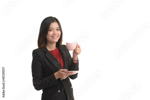 Asian business woman is holding a cup of coffee and expressing joy. On white Background.