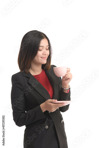 Asian business woman is holding a cup of coffee and expressing joy. On white Background.
