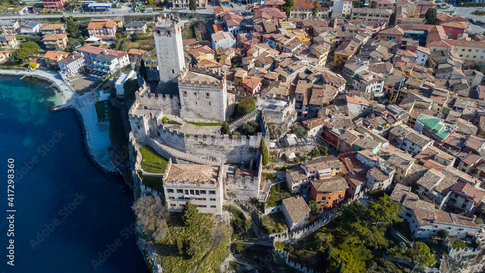 Incredible aerial view of the Medieval Castle of Malcesine on the shores of Lake Garda.