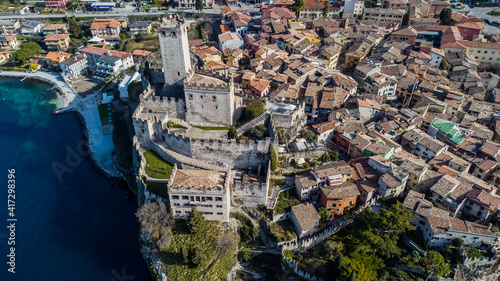 Incredible aerial view of the Medieval Castle of Malcesine on the shores of Lake Garda.