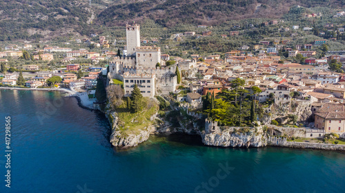 Incredible aerial view of the Medieval Castle of Malcesine on the shores of Lake Garda.