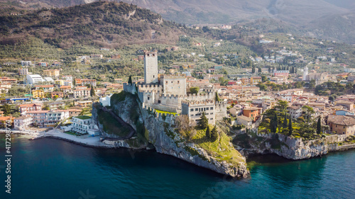 Incredible aerial view of the Medieval Castle of Malcesine on the shores of Lake Garda.