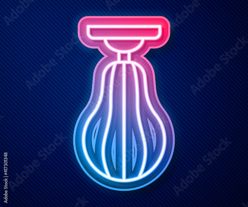 Glowing neon line Punching bag icon isolated on blue background. Vector.