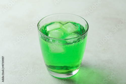Wallpaper Mural Glass of green soda on white textured background Torontodigital.ca