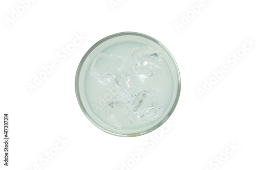 Glass of lemonade with ice cubes isolated on white background