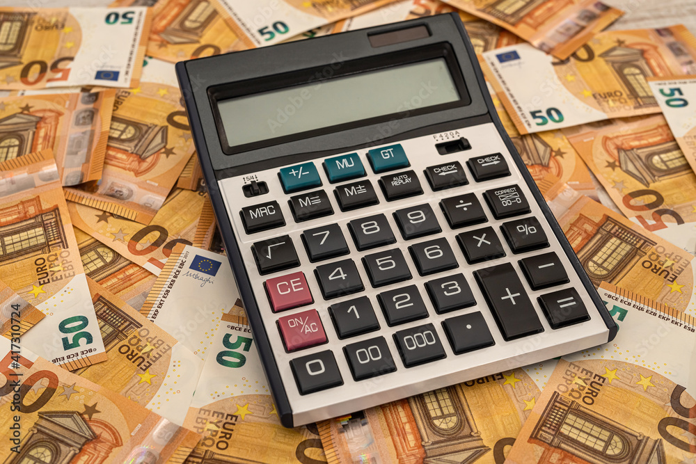 finance background concept euro bills with calculator finance background concept euro bills with calculator