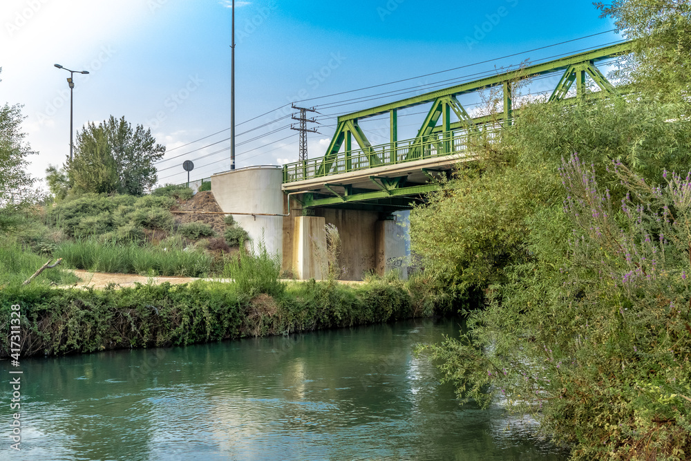 the green yosef bridge on the jordan river
