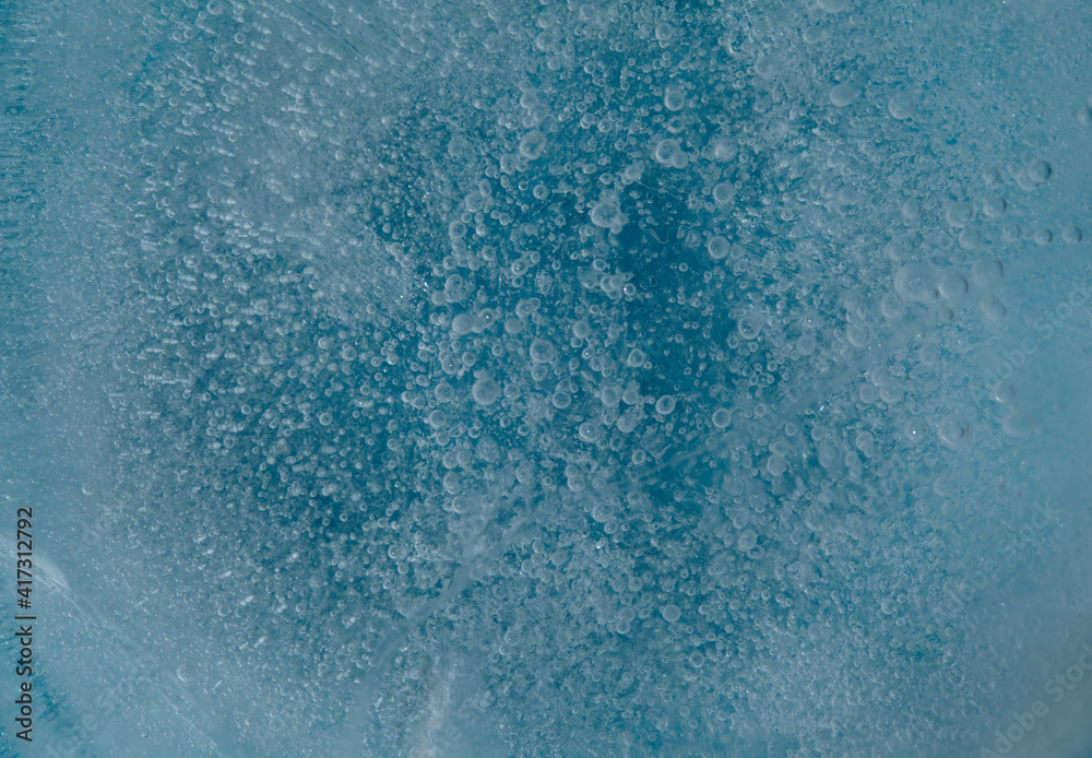 © Tamara Kulikova - Ice texture with small round air bubbles trapped inside