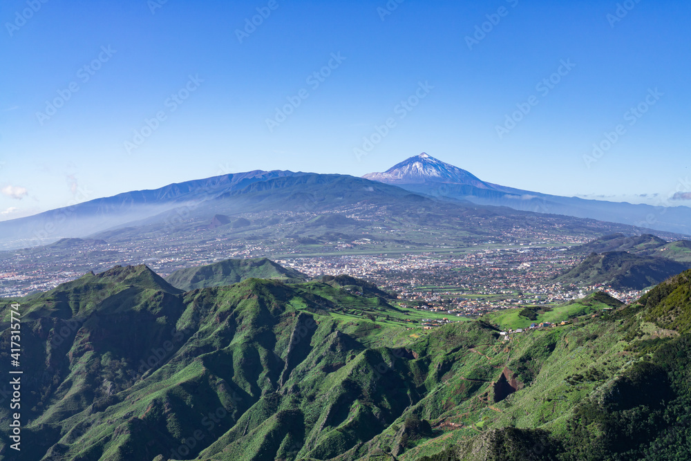 At the Pico del Ingles viewpoint on Tenerife, Spain with a view of the beautiful mountain landscape and the Teide