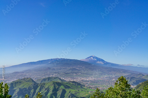 At the Pico del Ingles viewpoint on Tenerife, Spain with a view of the beautiful mountain landscape and the Teide