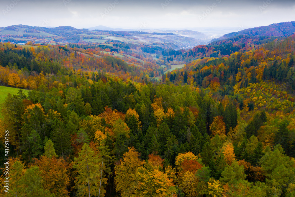 Panoramic countryside autumn view of hills and fields