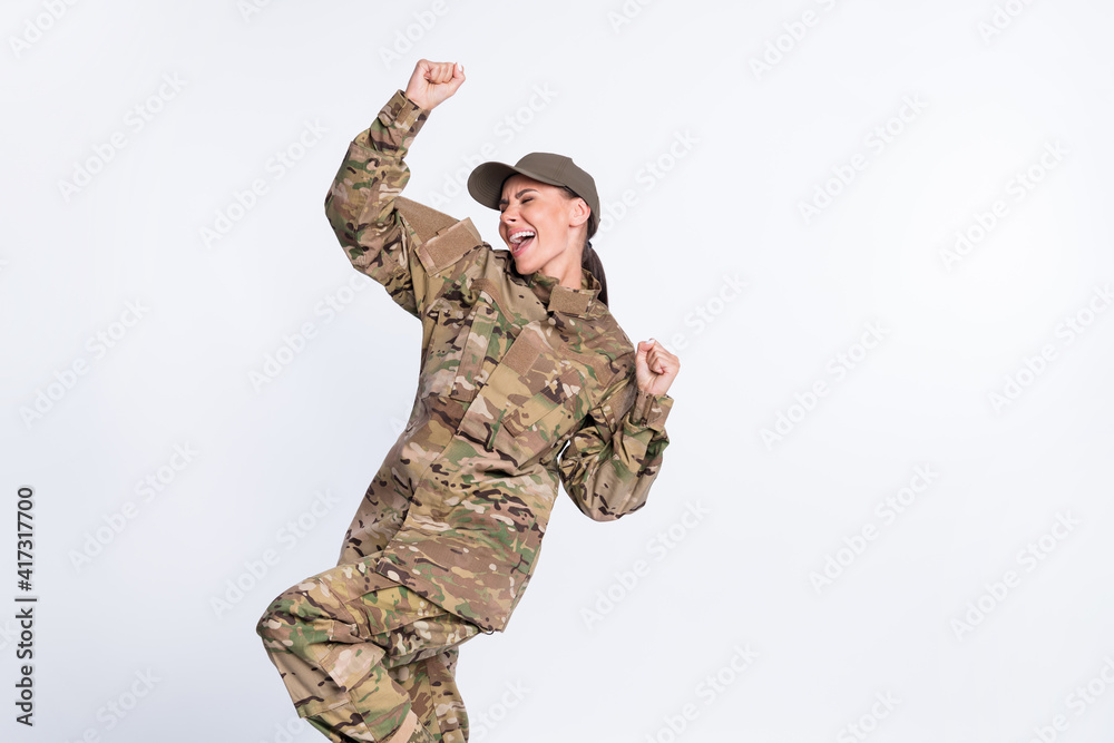 Portrait of delighted person closed eyes open mouth shout yes fists up isolated on white color background