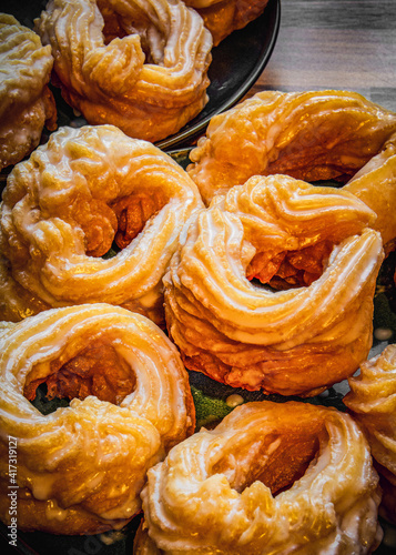 Closeup of yummy French cruller doughnuts