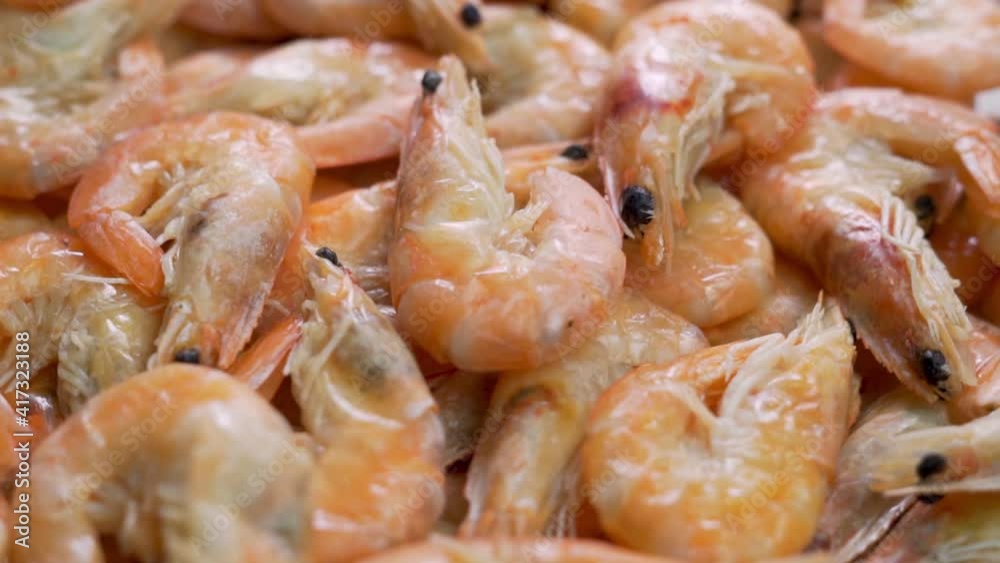 Healthy Cooked Unpeeled Shrimps, Seafood, Fish, Macro, Spin. The Concept of Healthy Sea Food and Diet. Healthy Cooked Unpeeled Shrimps, Seafood, Fish, Macro, Spin. The Concept of Healthy Sea Food and Diet.
