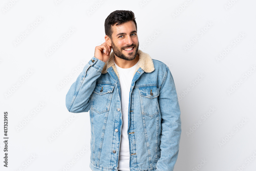 Young handsome man with beard isolated on white background laughing Young handsome man with beard isolated on white background laughing