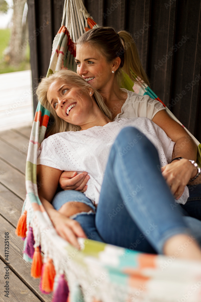 Couple lying in hammock