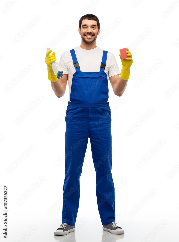 profession, cleaning service and people - happy smiling male worker or cleaner in overal and gloves with sponge and detergent over white background profession, cleaning service and people - happy smiling male worker or cleaner in overal and gloves with sponge and detergent over white background