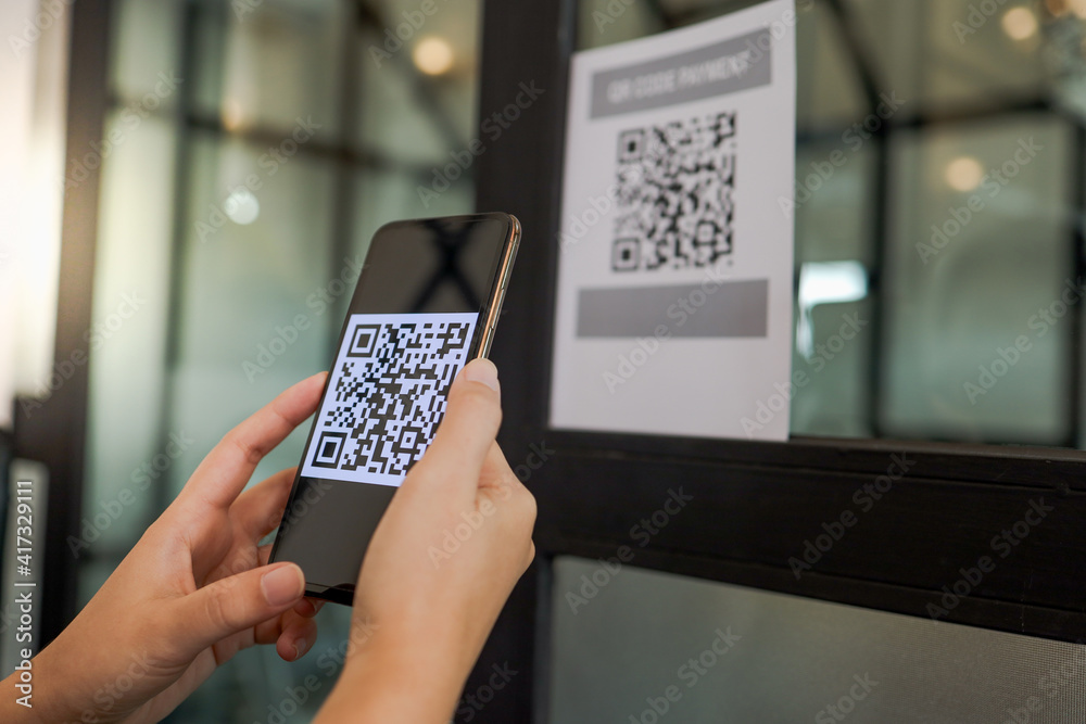 Qr code payment. E wallet. Man scanning tag accepted generate digital pay without money.scanning QR code online shopping cashless payment and verification.technology concept
