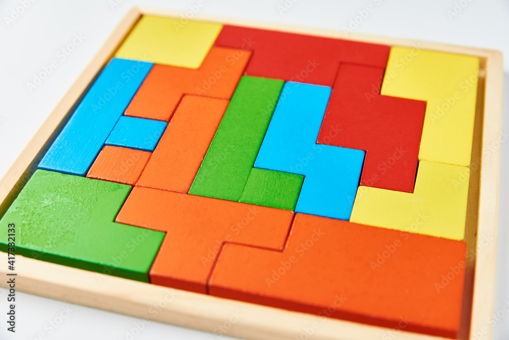 Different wooden blocks on white background. Concept of logical thinking and education Different wooden blocks on white background. Concept of logical thinking and education