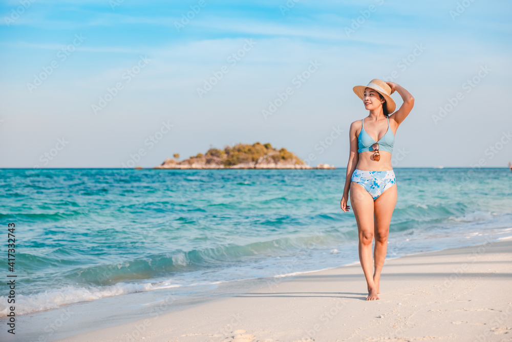Travel asian woman summertime relax on beach at day in Thailand summer season Travel asian woman summertime relax on beach at day in Thailand summer season