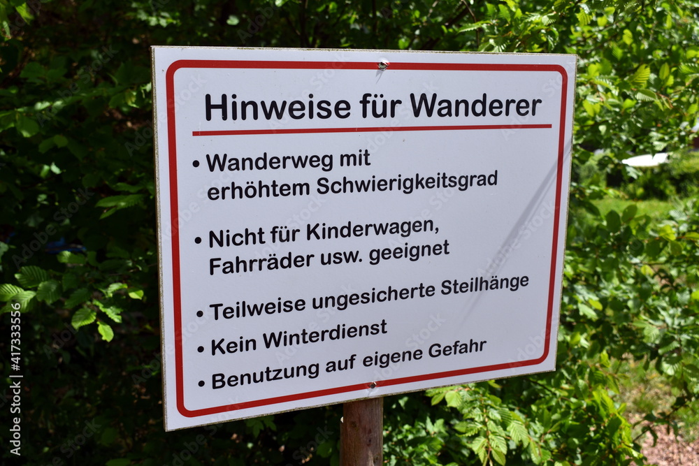 warning notices on a hiking trail