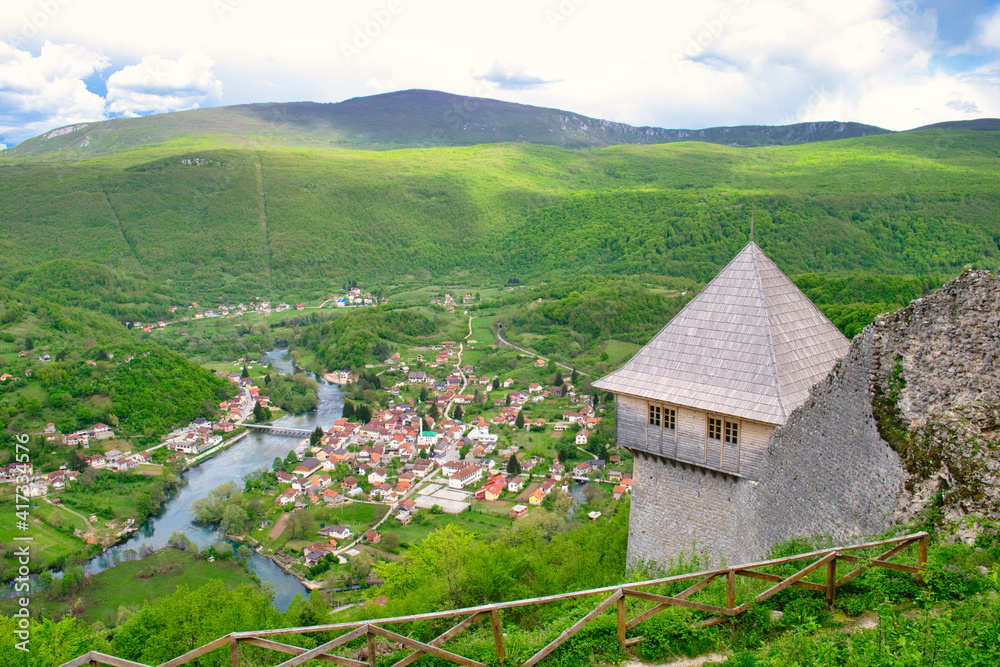 The magnificent panoramic view of the mountain valley of Una river and traditional village Kulen Vakuf from the top of ruined castle Ostrovica