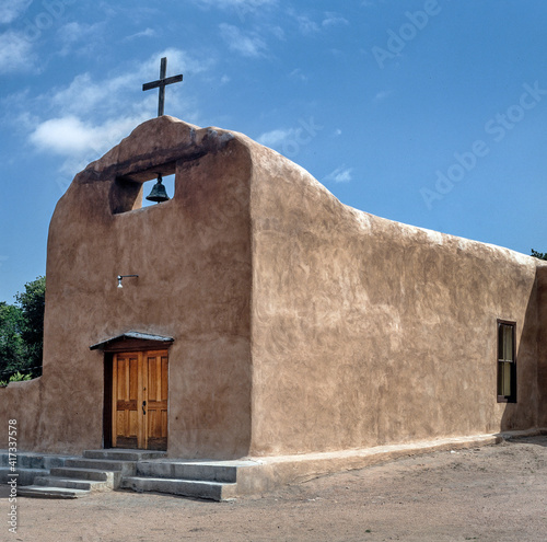 Adobe style. Loam church at Tesuque Pueblo indian community  Santa Fe County, New Mexico, United States. Indian culture. Indian reserve.  photo