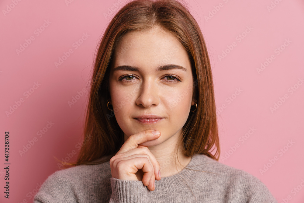 Close-up portrait of a casual pretty young smiling girl Close-up portrait of a casual pretty young smiling girl