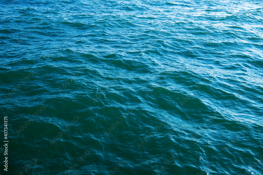 Obraz premium Blue sea water background texture