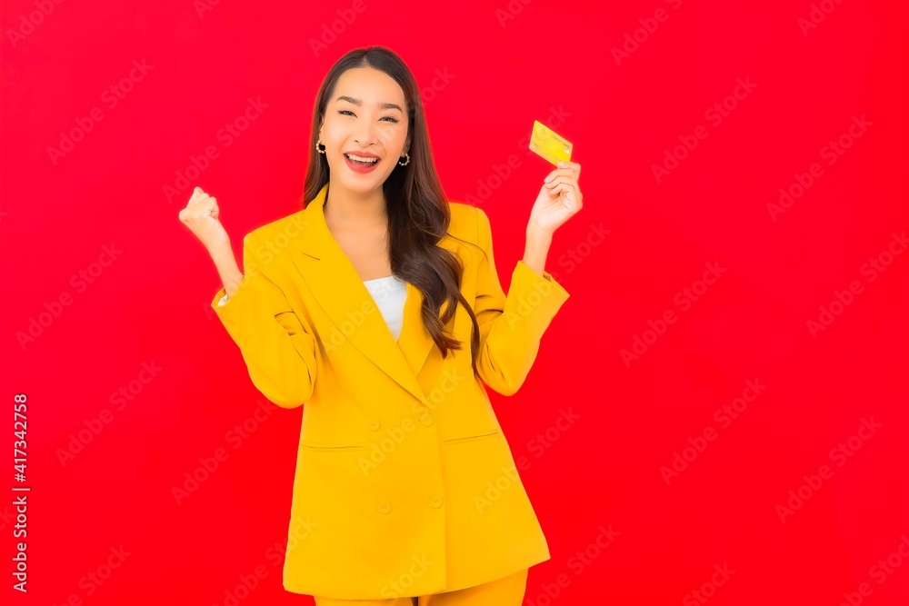 Portrait beautiful young asian woman use mobile with credit card Portrait beautiful young asian woman use mobile with credit card