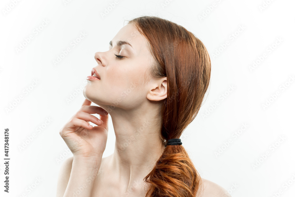 red-haired woman with bare shoulders gathered hair cropped view glamor sexy red-haired woman with bare shoulders gathered hair cropped view glamor sexy