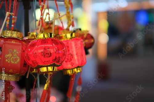 close up several traditional Chinese red lanterns at night