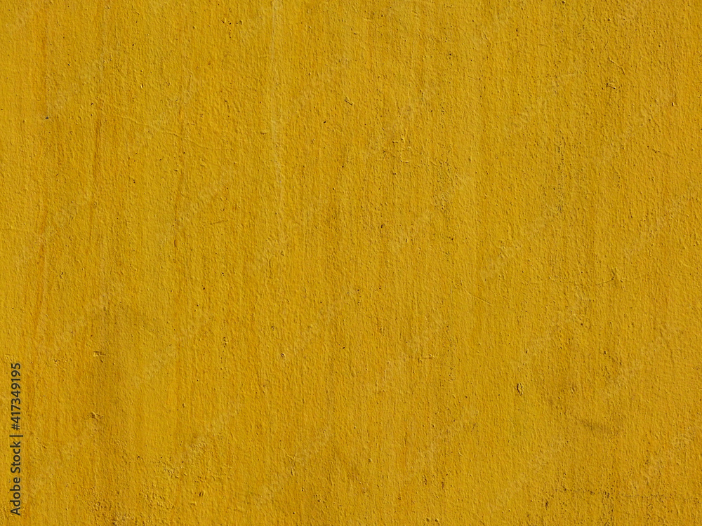 Fototapeta premium dirty yellow concrete wall texture