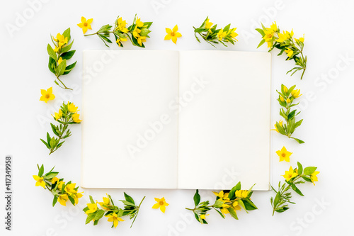 Happy Easter mockup - yellow flowers, flat lay, top view