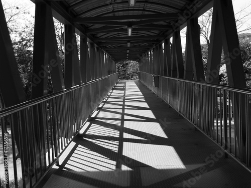 walkway on the overpass with sunshine and shadow, black and white style