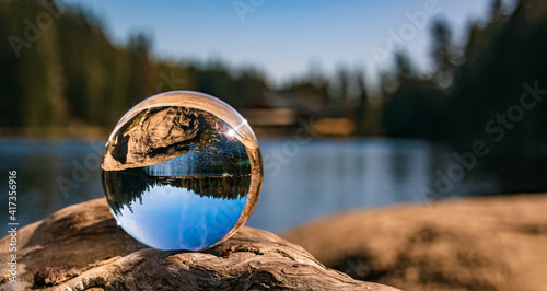 Crystal ball alpine summer landscape shot at the famous Grosser Arbersee, Bayerisch Eisenstein, Bavarian forest, Bavaria, Germany