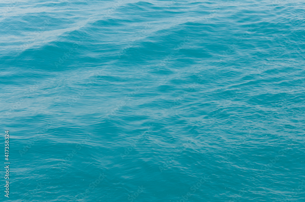 Water texrured background. Calm sea ripples Water texrured background. Calm sea ripples