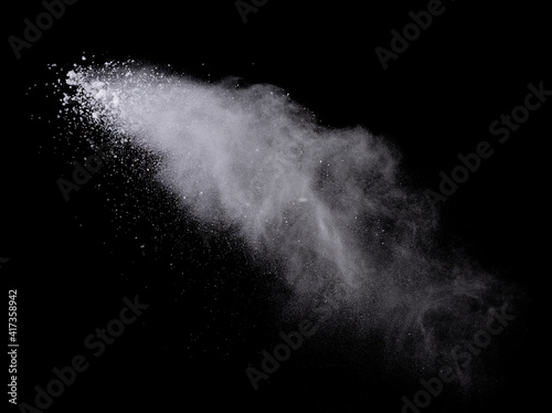 Abstract design of white powder cloud splash isolated on black background