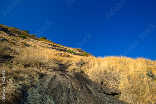 The natural background of the morning light rising in the middle of the sea and surrounded by mountains  cool breezes  the beauty of the ecology of the tourist attractions.