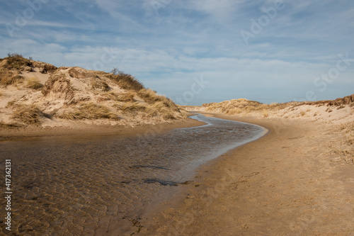 Walking through the slufter valley on the Wadden island of Texel, a sandy plain that is openly connected to the North Sea, the Netherlands