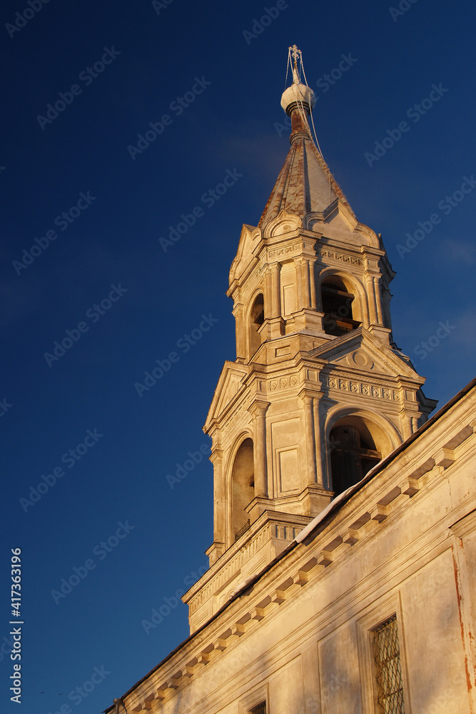 Russia, Tver region. 01.03.2005: Kalyazin district. Kashin. Stone bell tower of the Cathedral of the Resurrection, built in the 18th century. Winter clear morning