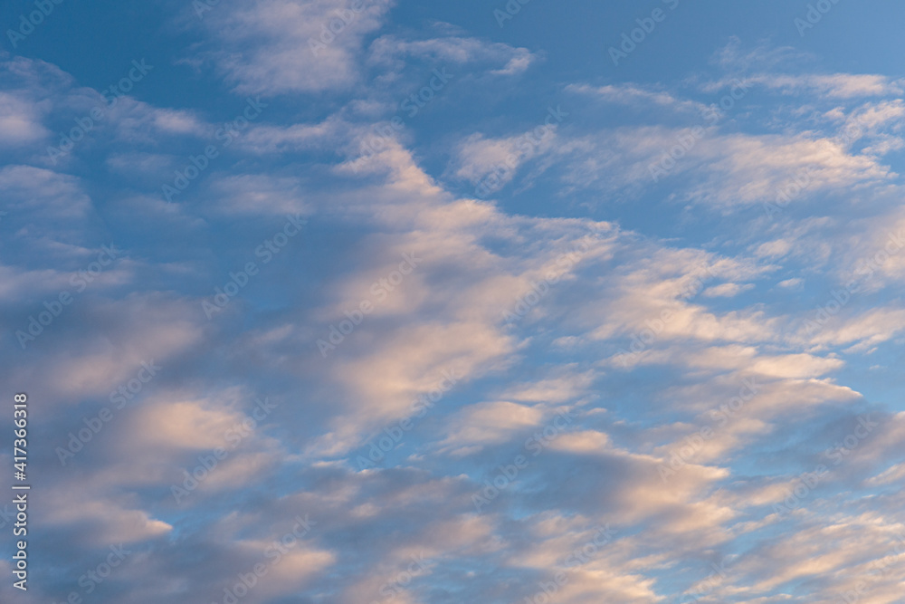 White clouds on a blue sky. Sky and clouds  as patterns background.