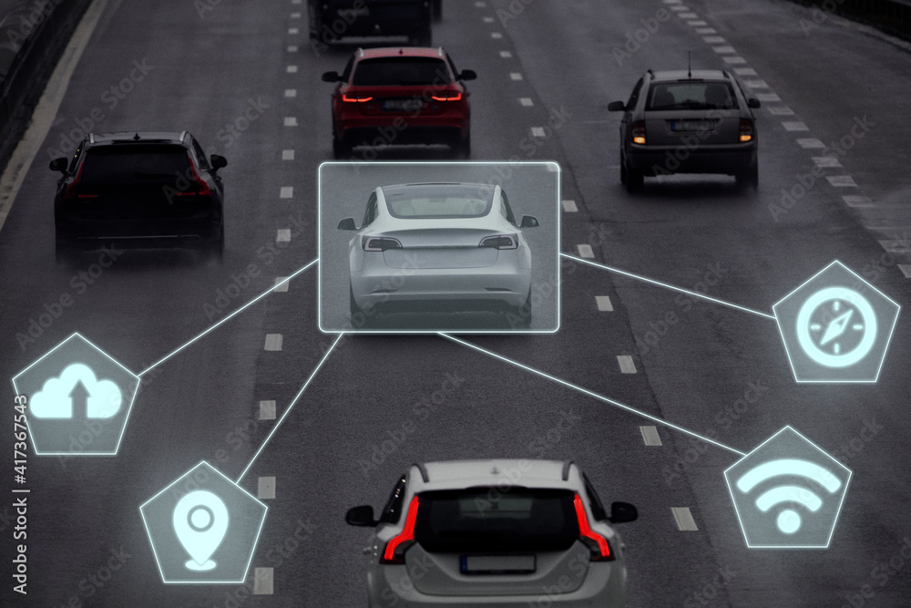 Cars on road with computer icons Cars on road with computer icons