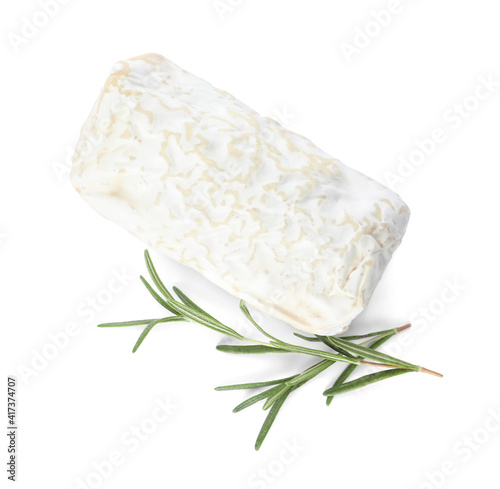 Delicious fresh goat cheese with rosemary on white, top view